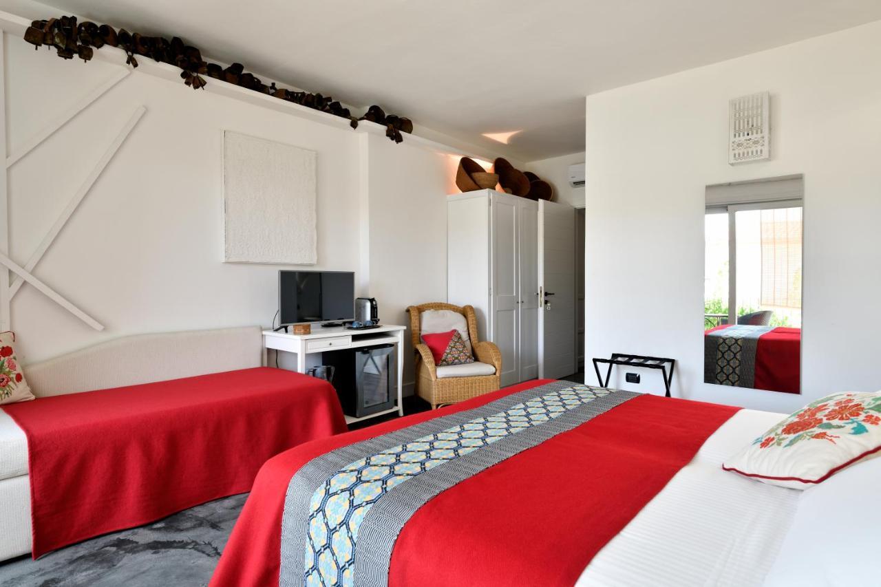 Lughia Bed & Breakfast ตอร์โตลี ภายนอก รูปภาพ